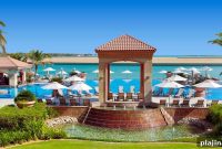 Al Raha Beach Hotel: Luxury Waterfront Rooms & Amenities