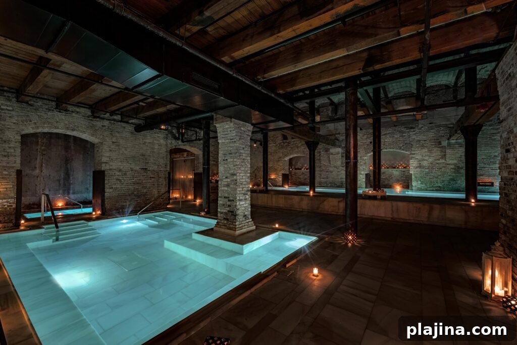 AIRE Ancient Baths candlelit pool