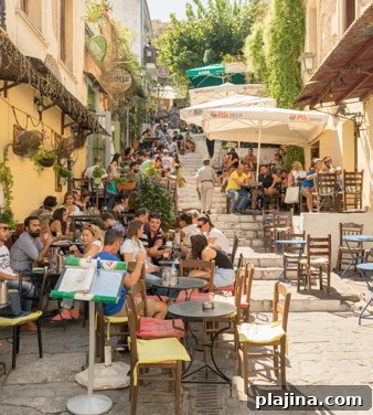 Tourists and locals drinking coffee in the Plaka district