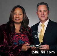 Quida Hartley, customer service representative and platinum ambassador, Hertz; Aaron Medina, regional vice president, Hertz