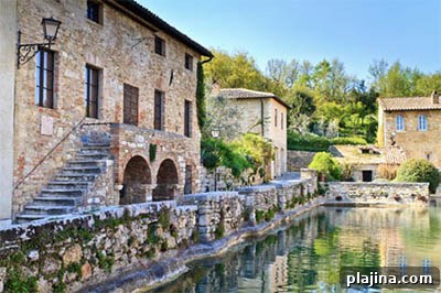 Old thermal baths in the medieval village of Bagno Vignoni