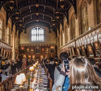 Tourists flock to the Great Hall of Christ Church College, University of Oxford, made famous in the Harry Potter movies