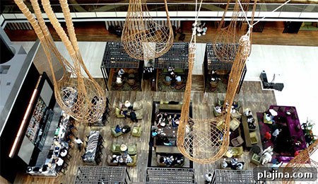 Hilton Buenos Aires' new lobby with wicker artwork resembling fishing nets © JOANNA TRICORACHE