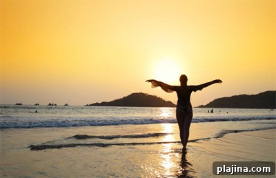 Young woman meditating on Agonda Beach